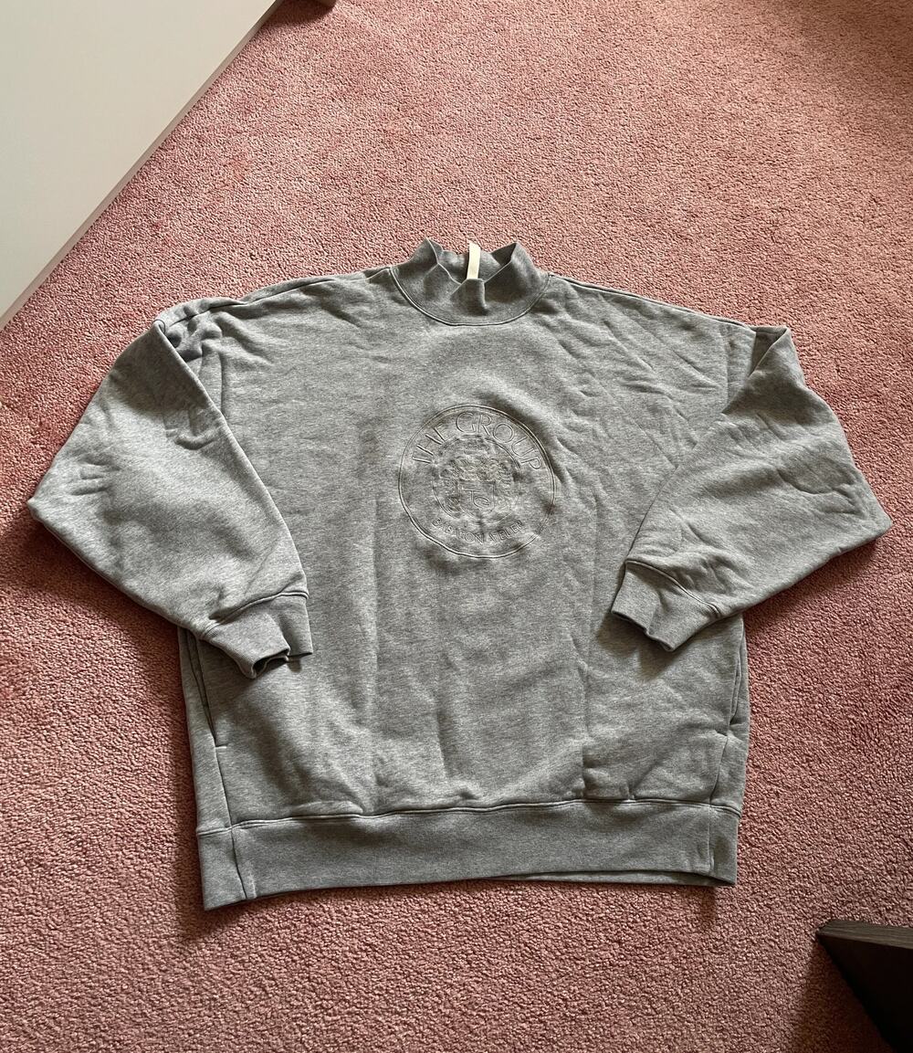 The Group Babaton grey mock neck sweatshirt with tonal embossed crest logo